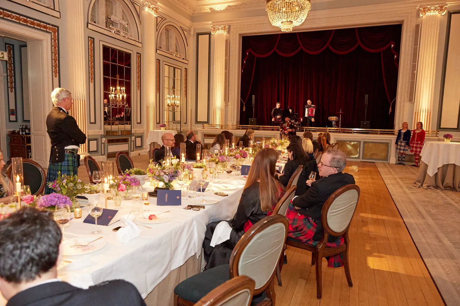 Gala dinner in the Gleneagles ballroom with piper and highland dancers on stage