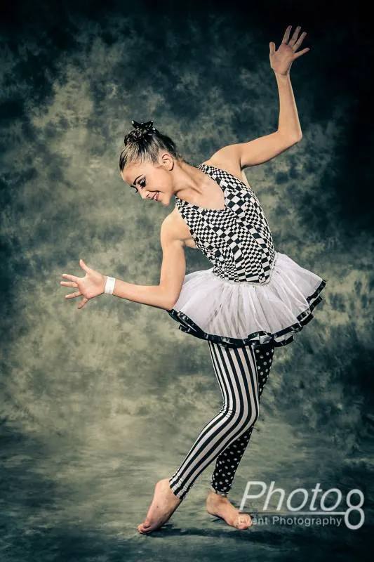 Dancer captured mid-movement in a blur-free action shot