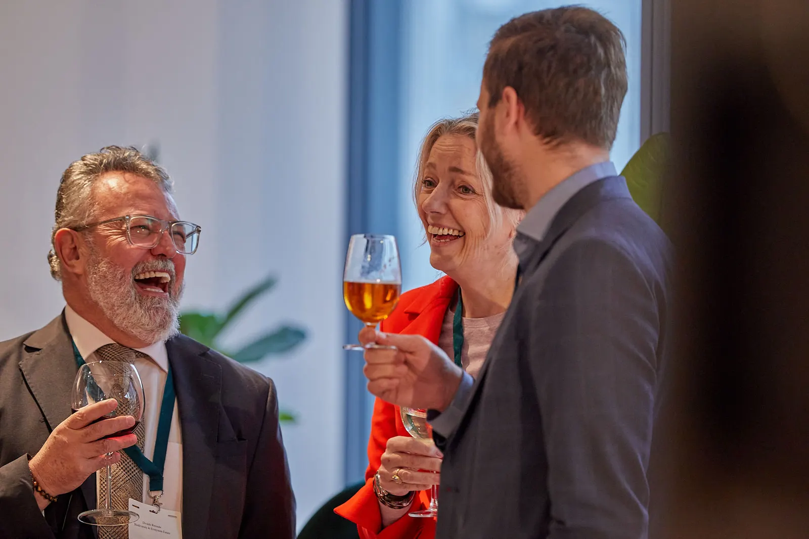 Guests enjoying wine at a corporate drinks reception in London