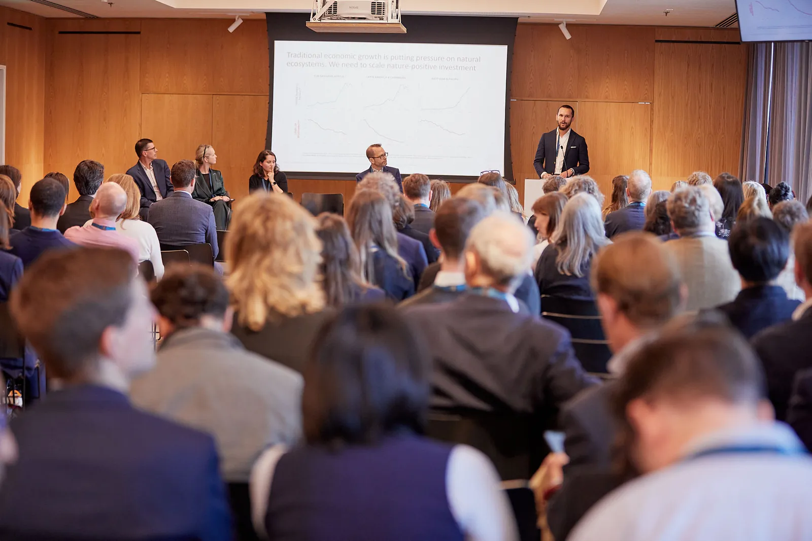 Full audience seated at a large UK business conference