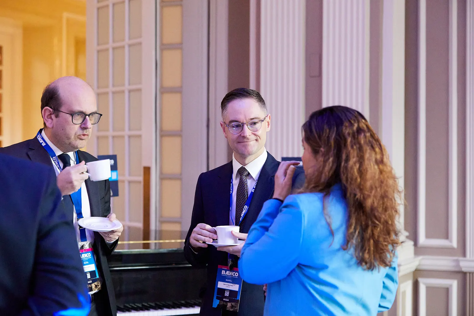 Delegates chatting over coffee between sessions at an Edinburgh conference