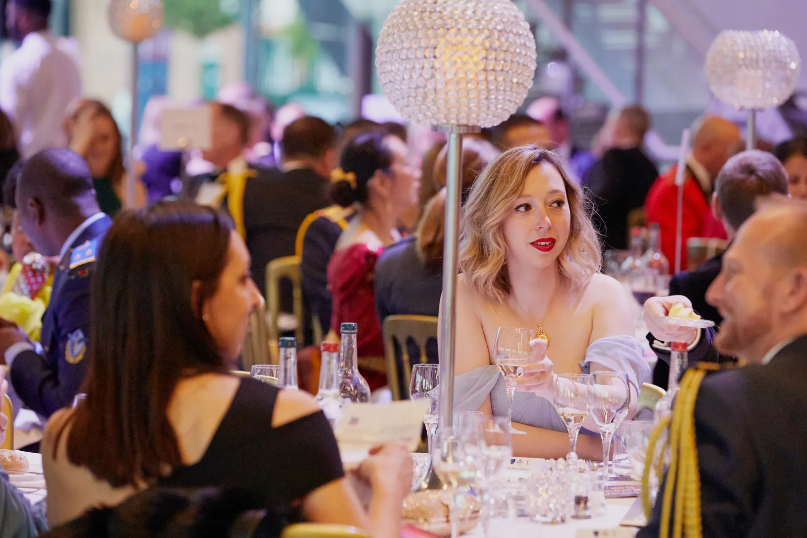 Guests at a black-tie gala dinner
