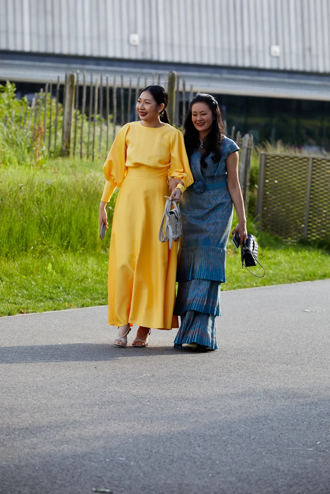 Guests in evening wear arriving at a gala