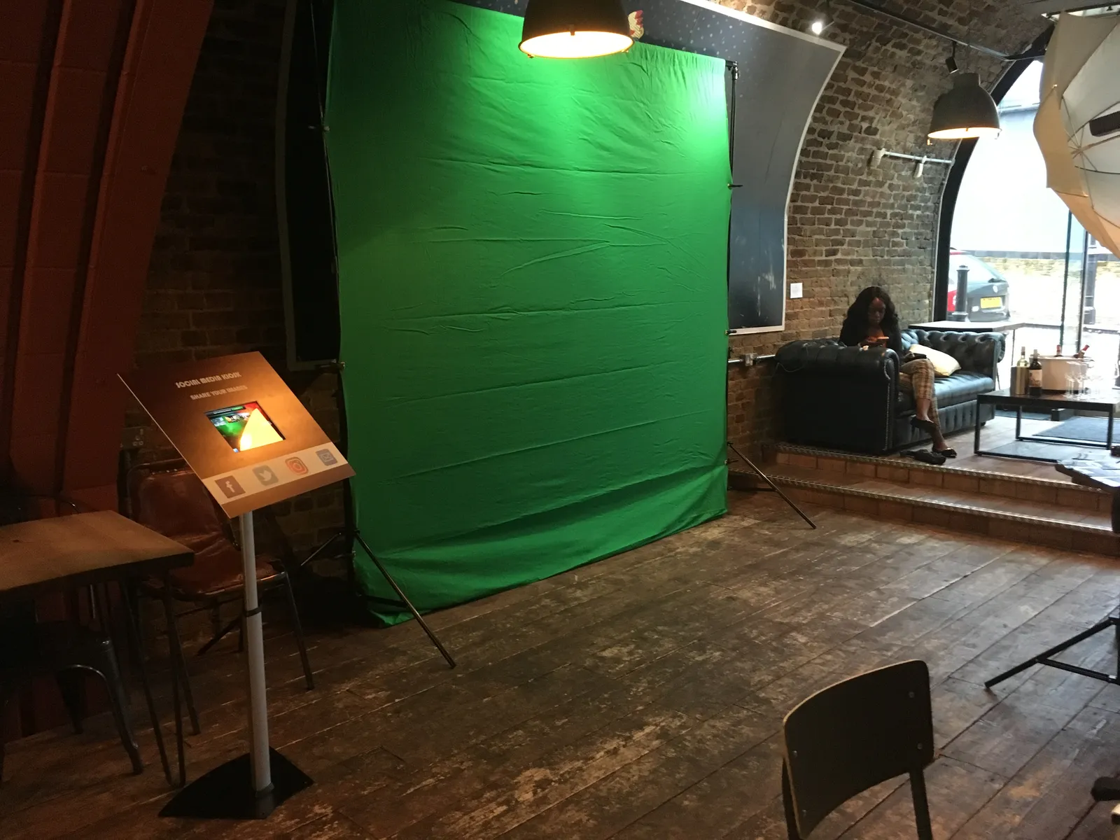 Green screen studio and social media kiosk at a railway-arch venue in Bankside