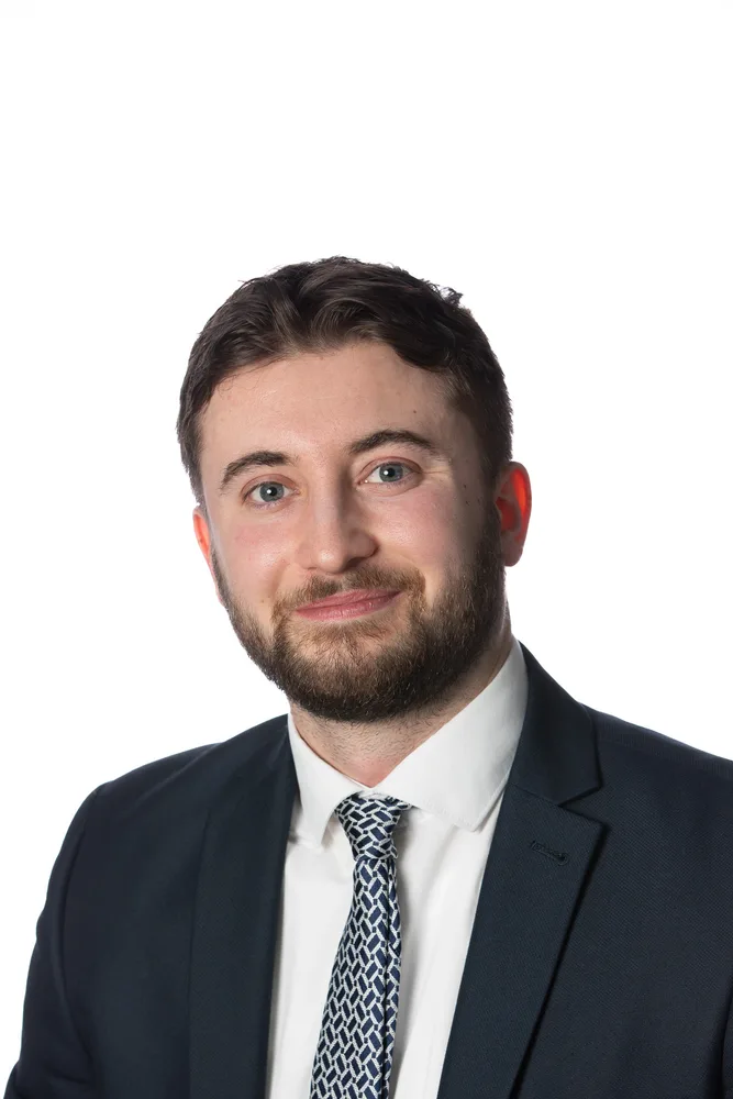 Corporate headshot taken at an on-site studio